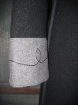 Detalj av broderad manchett