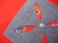 Detalj av handsydd stj?a i kattun