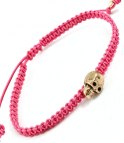 Rosa armband med liten dödskalle