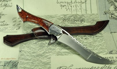 Ent -  Fighter in RWL34 with Damasteel bolsters and stabilized Redwood burl.