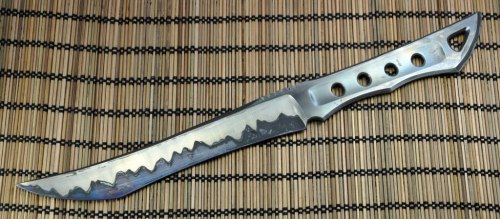 Blade back from heat treating! Now we start all over with the finish again...